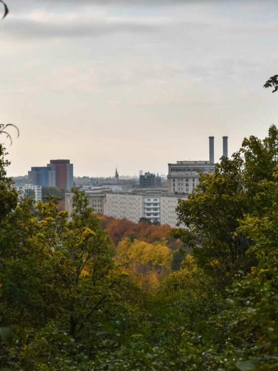 change and moving forward skyline over Berlin with fall foliage